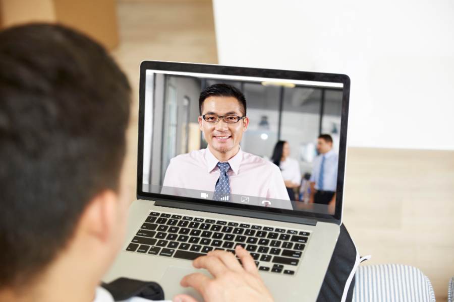 Having a virtual meeting.