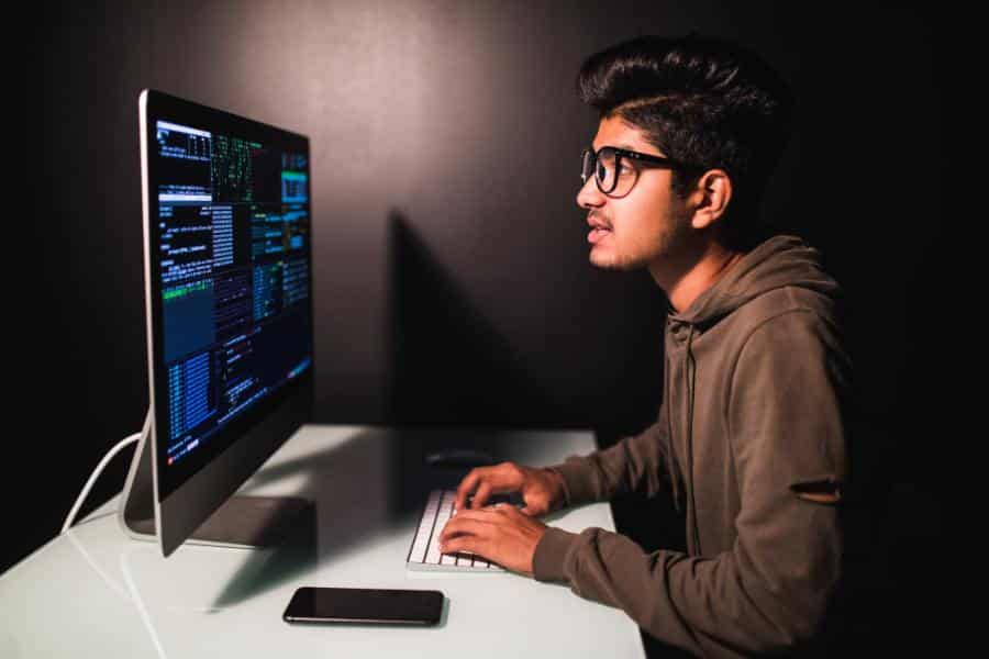 An employee focused on the monitor.